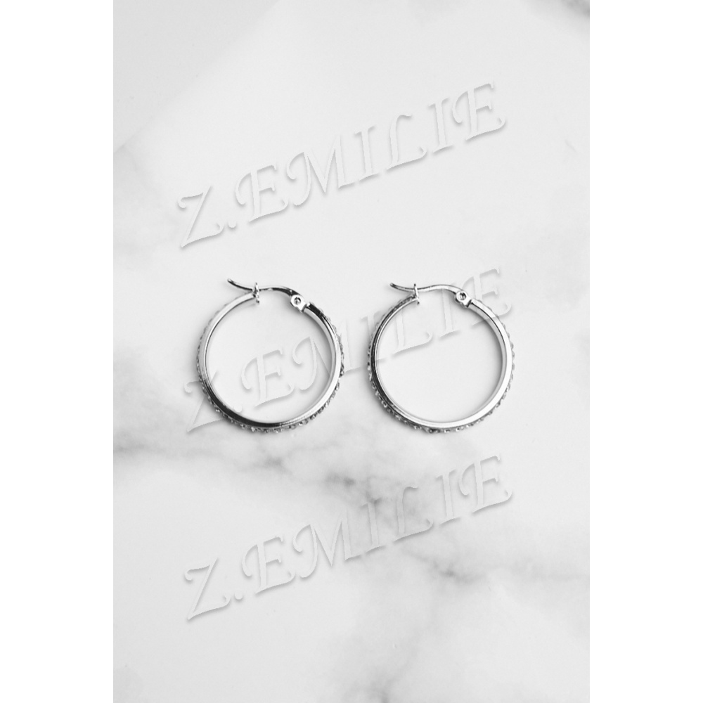 BOUCLE D'OREILLE EN ACIER COLEUR ARGENT